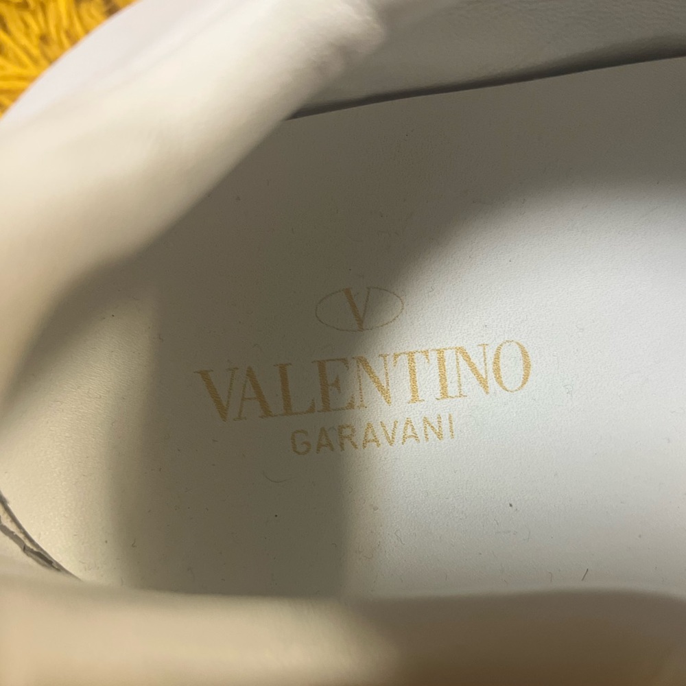 Women’s sz 45 white Valentino Garavani gold studded leather sneakers.